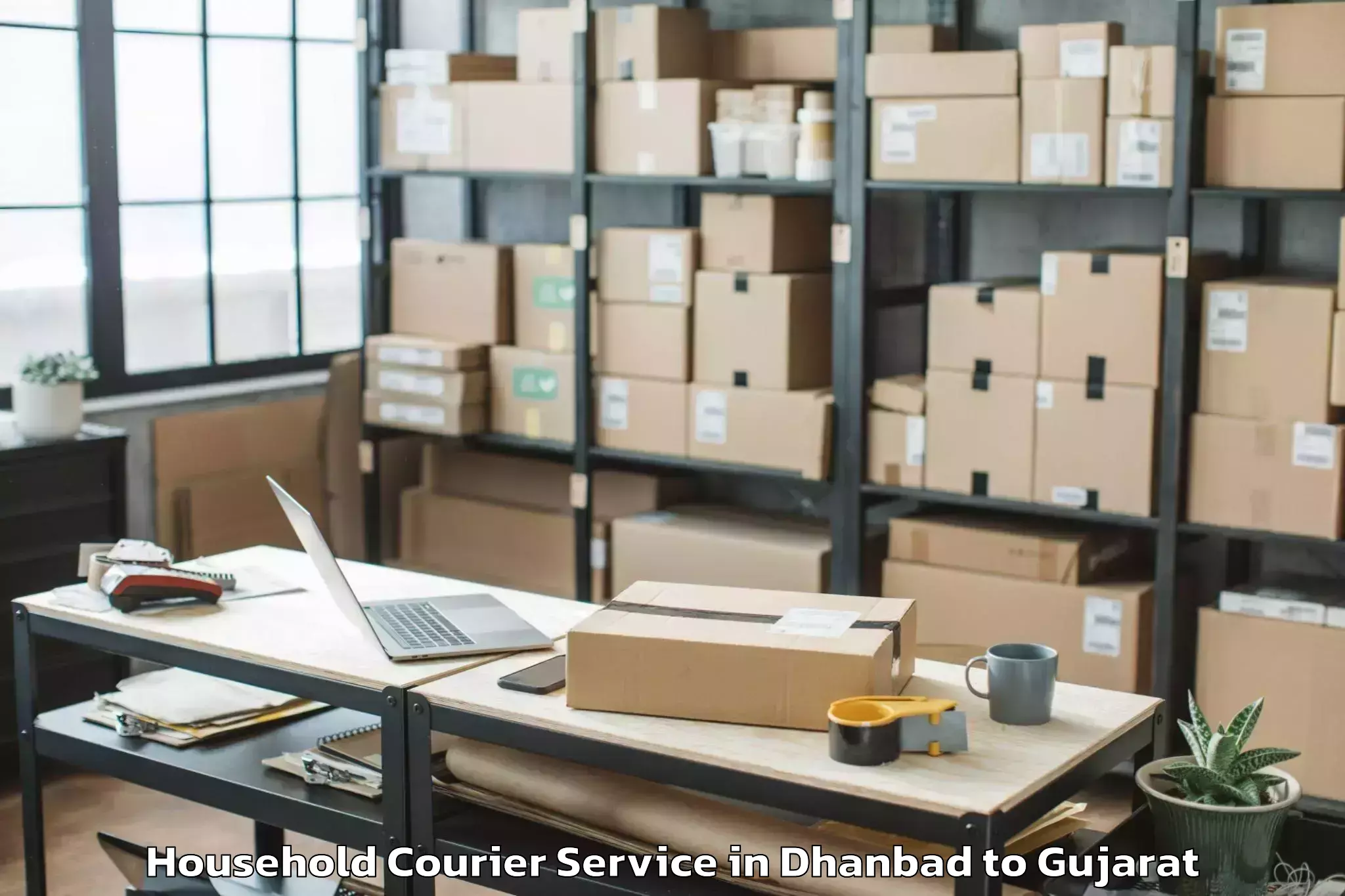 Trusted Dhanbad to Hemchandracharya North Gujarat Household Courier